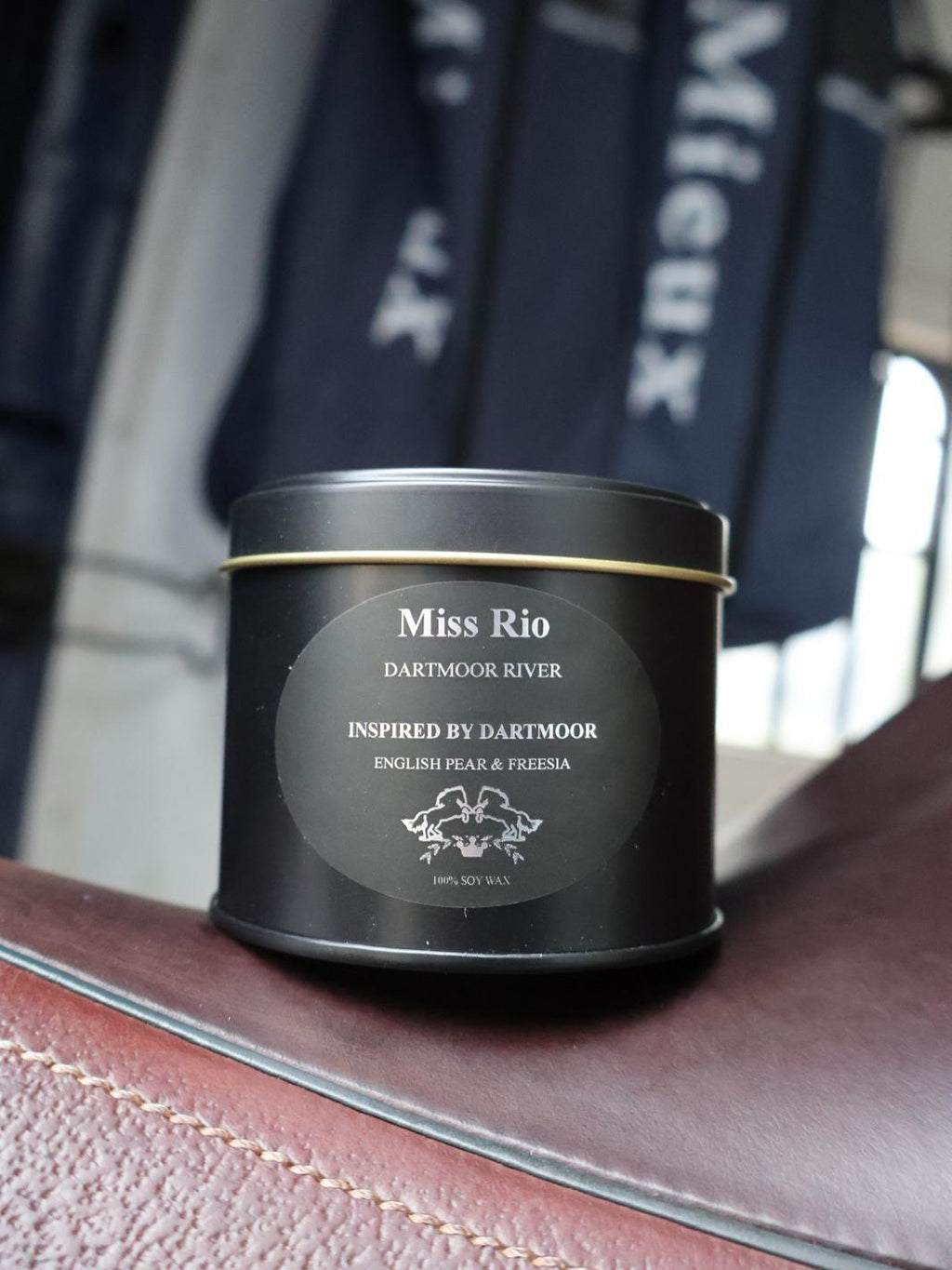 Luxury soy candle in a Matt black tin hand poured by Miss Rio 