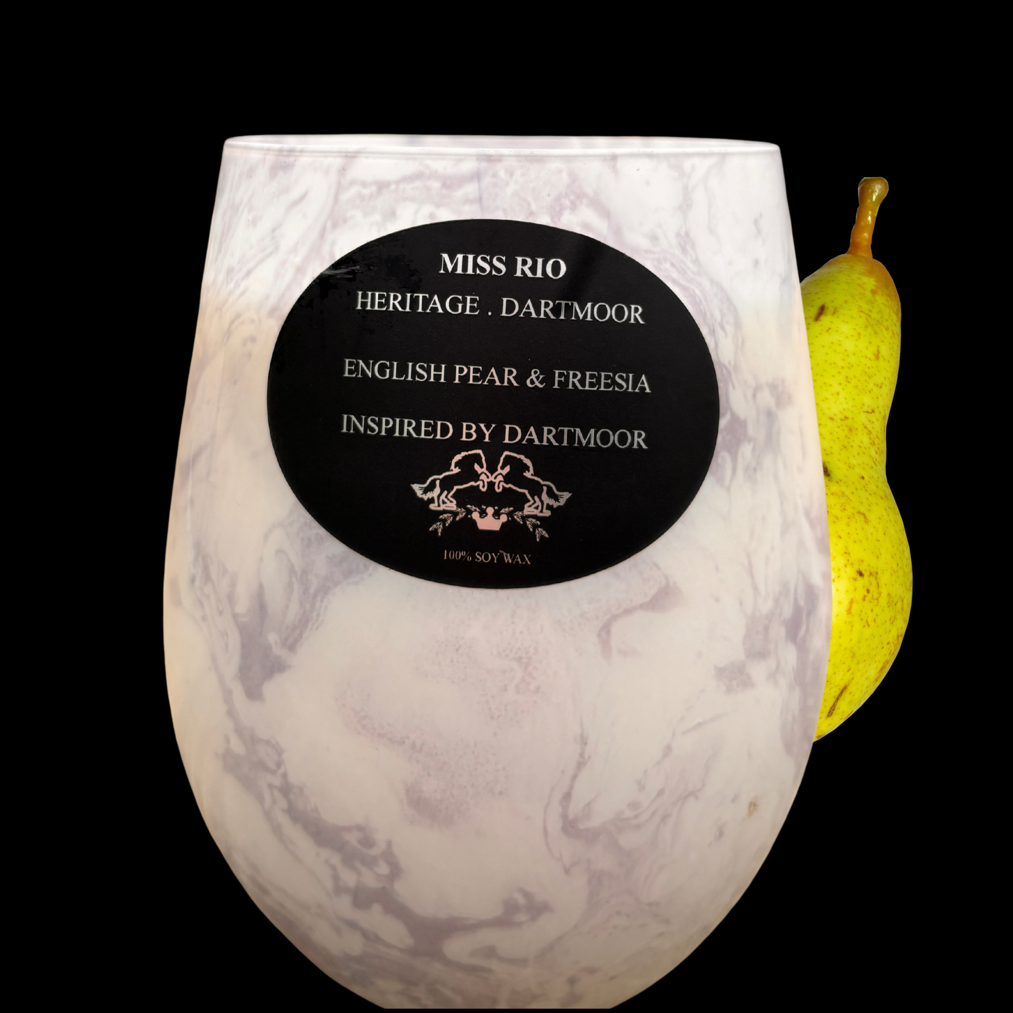 Miss Rio English Pear & Freesia luxury soy candle with Dartmoor tor landscape, inspired by Devon countryside heritage.